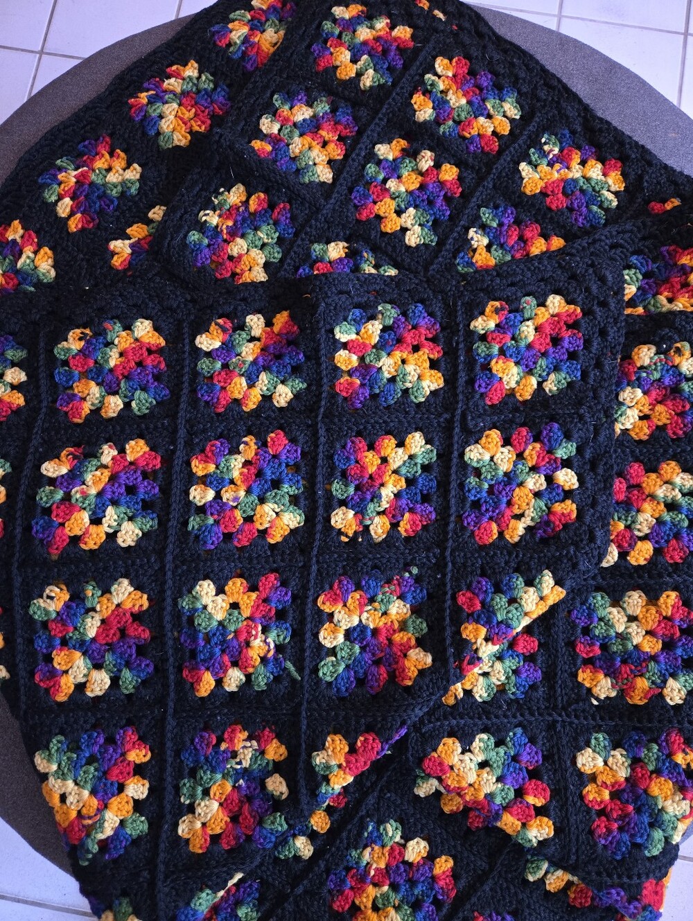 Handmade Black Crochet Granny Square Blanket with Multicolor Accents